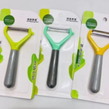 Curățător de legume multifuncțional cu ventuză, culoare vibrantă, design modern
