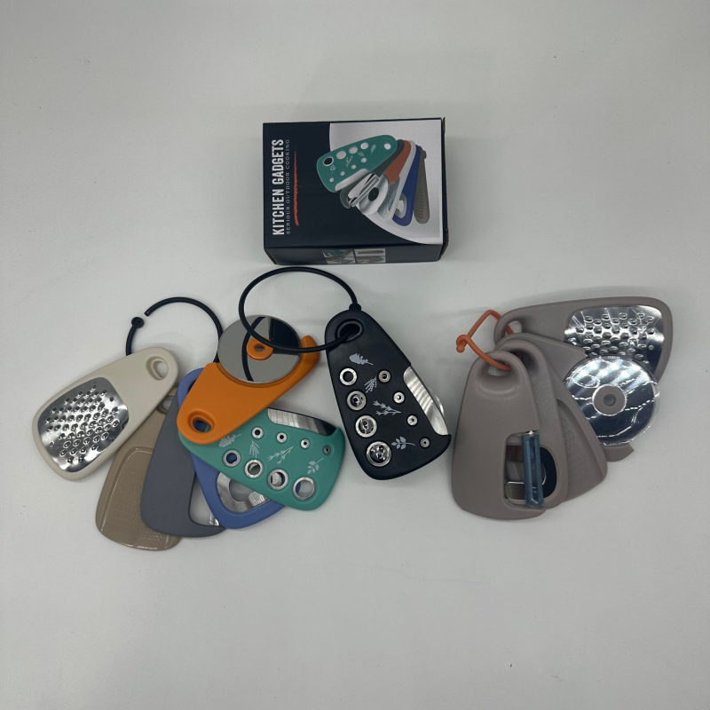 Set de 6 unelte de bucătărie din oțel inoxidabil, stivuibil — răzuitor pentru pepene, tăietor pentru plante aromatice și deschizător de sticle