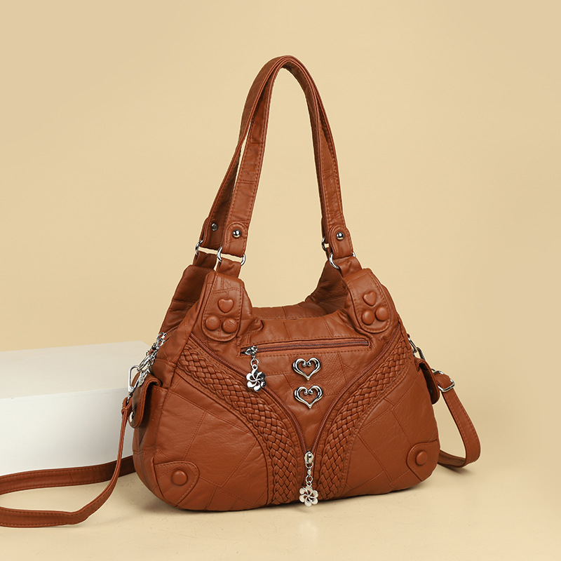 Ženska torba s metalnim rivetima, velika prostornost, PU koža, ramena i crossbody, 2025 novi model