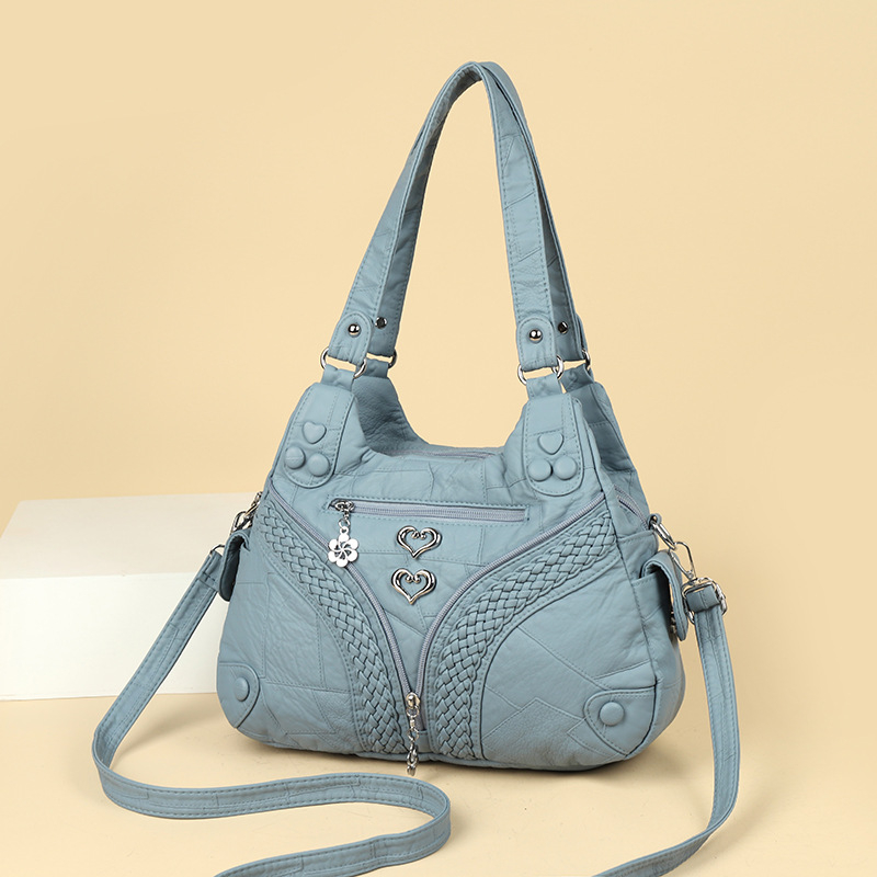 Ženska torba s metalnim rivetima, velika prostornost, PU koža, ramena i crossbody, 2025 novi model