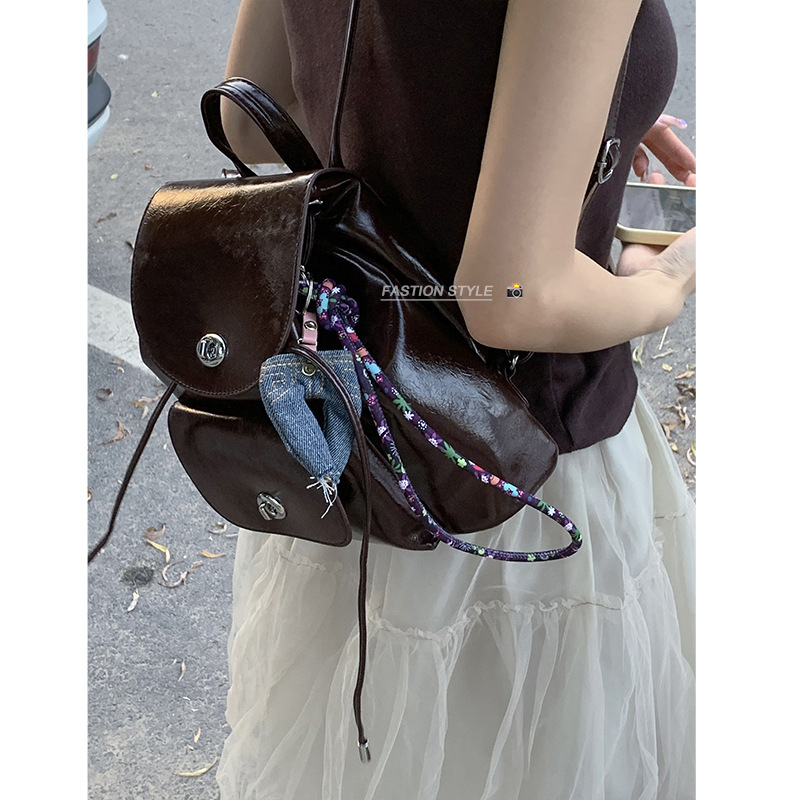 Butongke ženski ruksak u akademskom stilu, nišni dizajn, 2024 jesen retro moda, mali svakodnevni ruksak