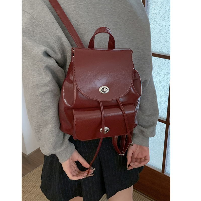 Butongke ženski ruksak u akademskom stilu, nišni dizajn, 2024 jesen retro moda, mali svakodnevni ruksak