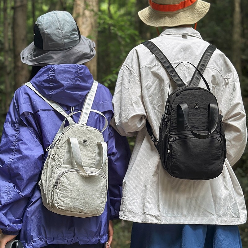 Dvojno funkcionalna crossbody torba i platneni ruksak za putovanja, lagana, unisex, model 2026