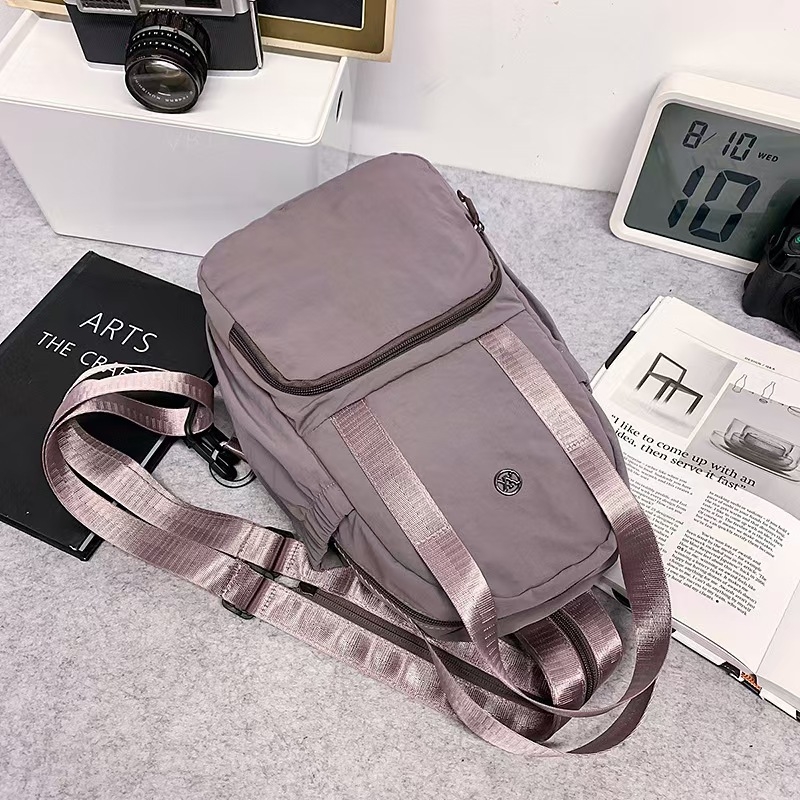 Dvojno funkcionalna crossbody torba i platneni ruksak za putovanja, lagana, unisex, model 2026