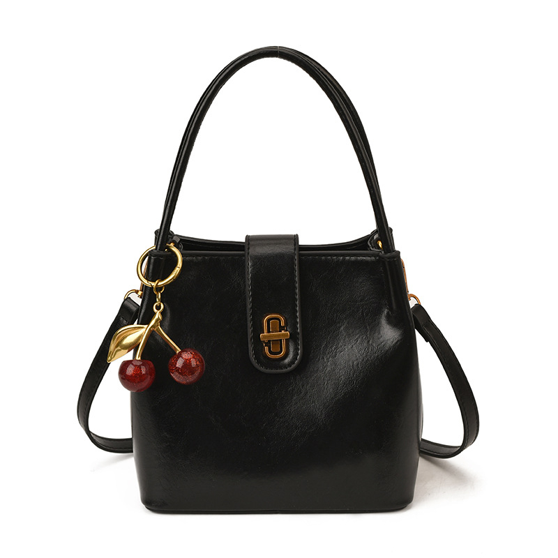 Ženska bucket torba u stilu light luxury, s retro teksturom, jednostavan dizajn, svestrana za rameni ili crossbody, 26 novih modela, proljeće 2026