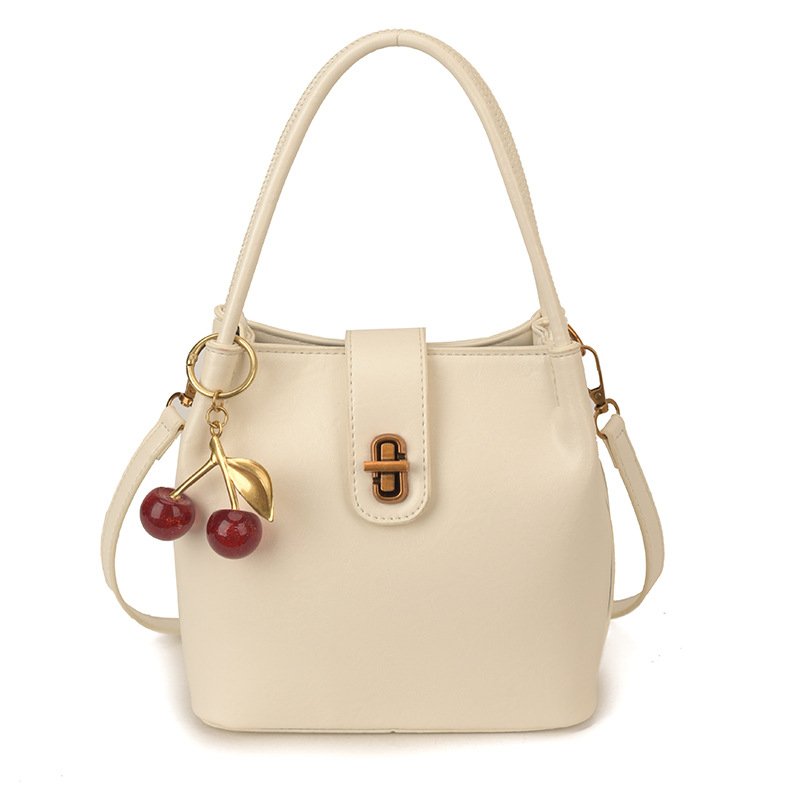 Ženska bucket torba u stilu light luxury, s retro teksturom, jednostavan dizajn, svestrana za rameni ili crossbody, 26 novih modela, proljeće 2026