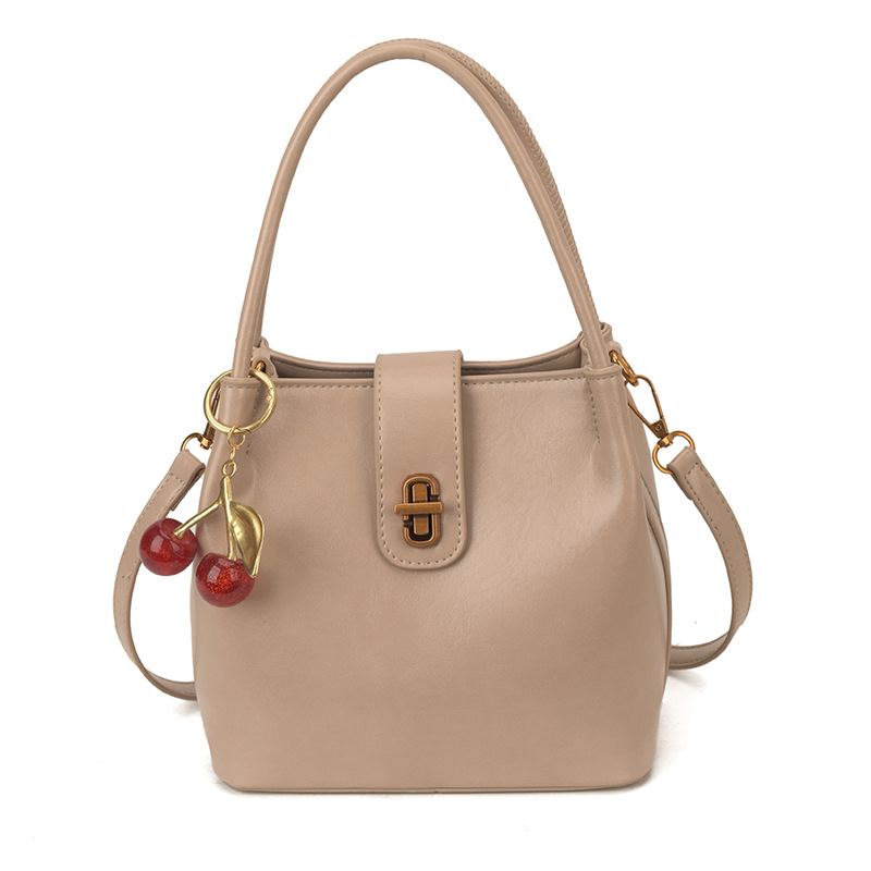 Ženska bucket torba u stilu light luxury, s retro teksturom, jednostavan dizajn, svestrana za rameni ili crossbody, 26 novih modela, proljeće 2026