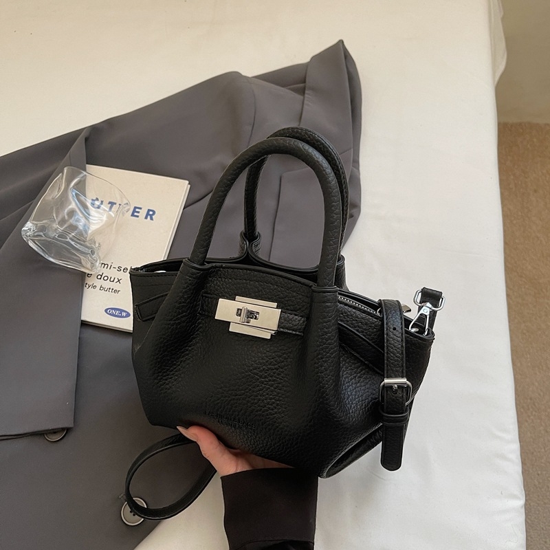 Női koreai stílusú bucket táska öv díszítéssel, 2026 téli modell, váll- és crossbody kivitel