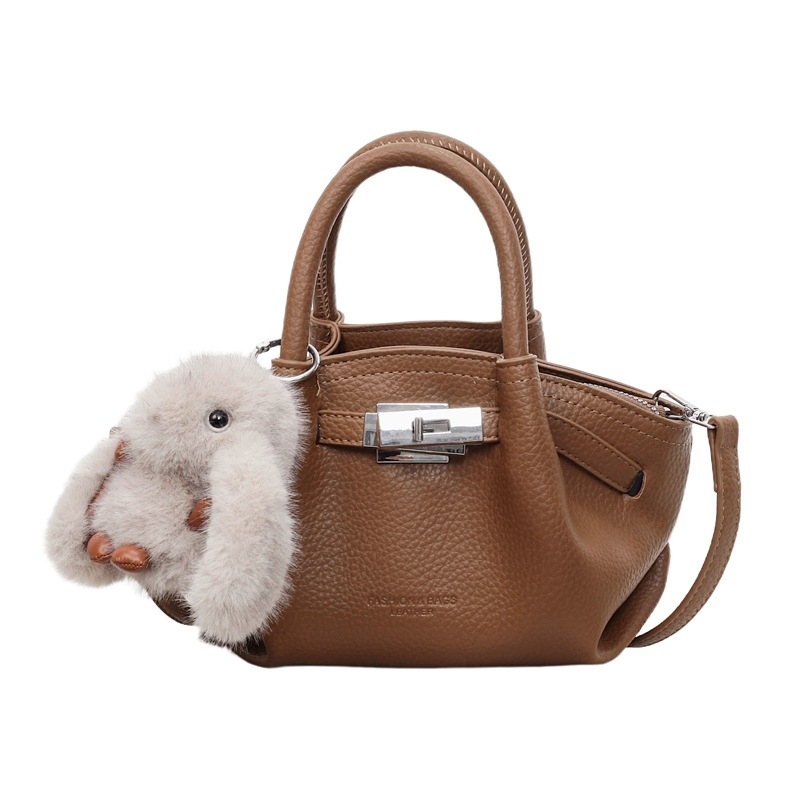 Női koreai stílusú bucket táska öv díszítéssel, 2026 téli modell, váll- és crossbody kivitel