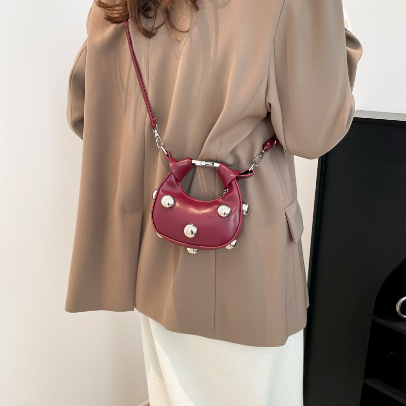 Ženska mini PU kožna crossbody torbica, proljeće 2025, moderan stil