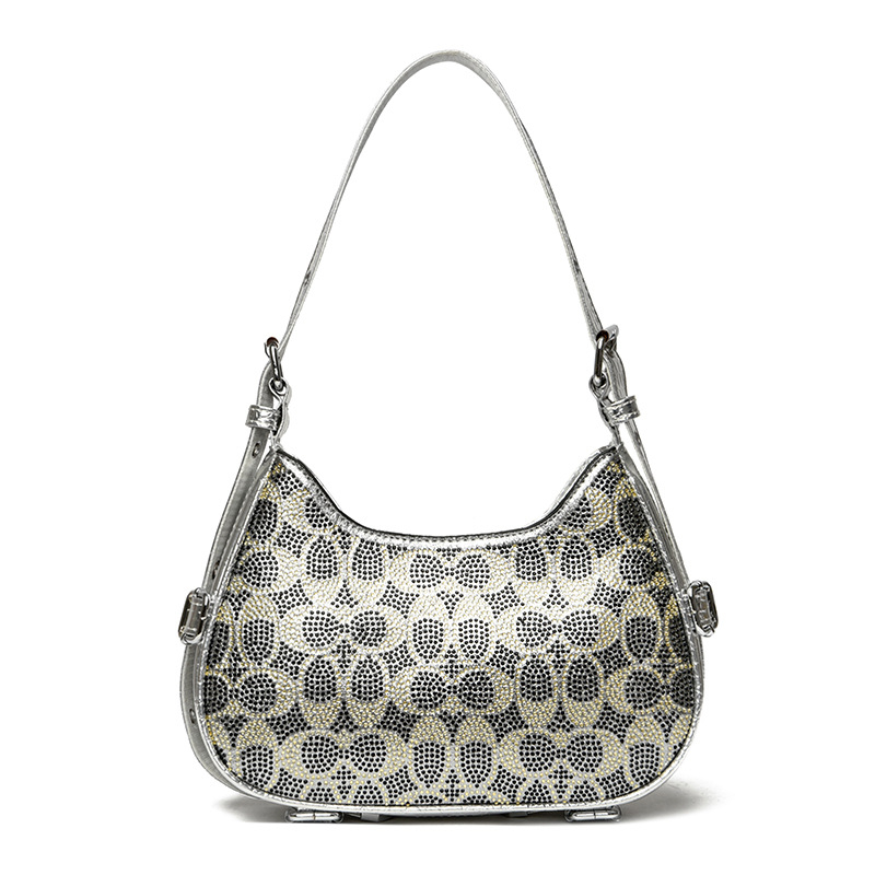 Francia inspirációjú niche dizájn női hónaljtáska, 2024 nyári modell, vintage nyereg alakú táska, magas minőségű textúra, keresztpántos kivitel.