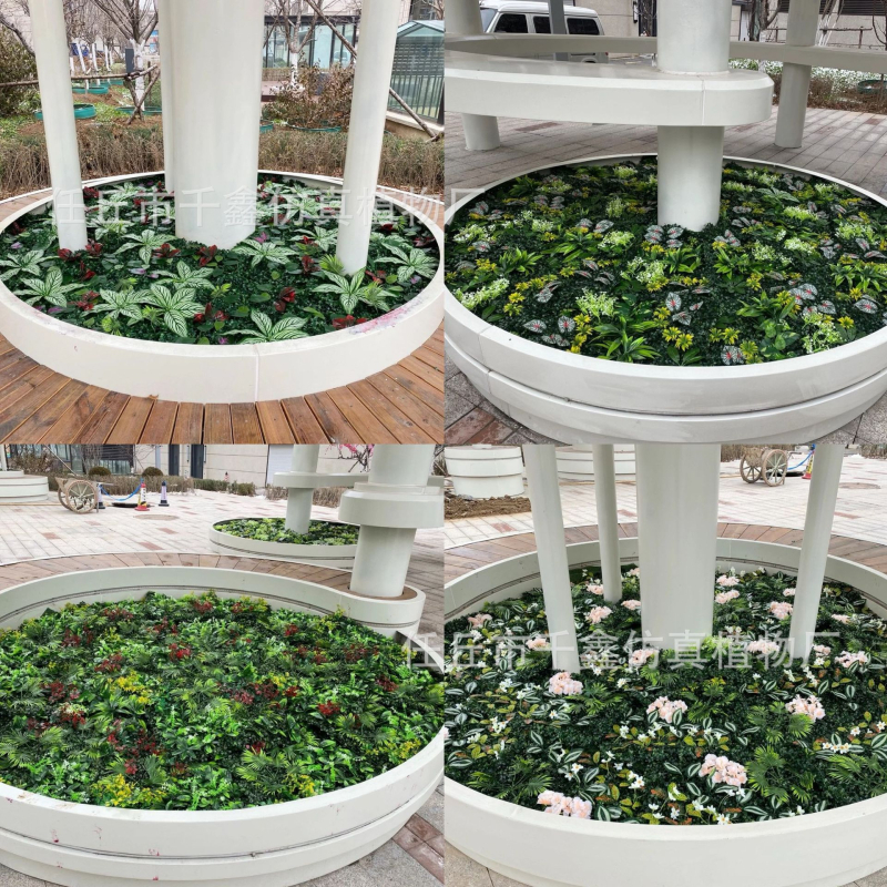 Perete decorativ cu plante artificiale, flori false și gazon artificial pentru fundal realist