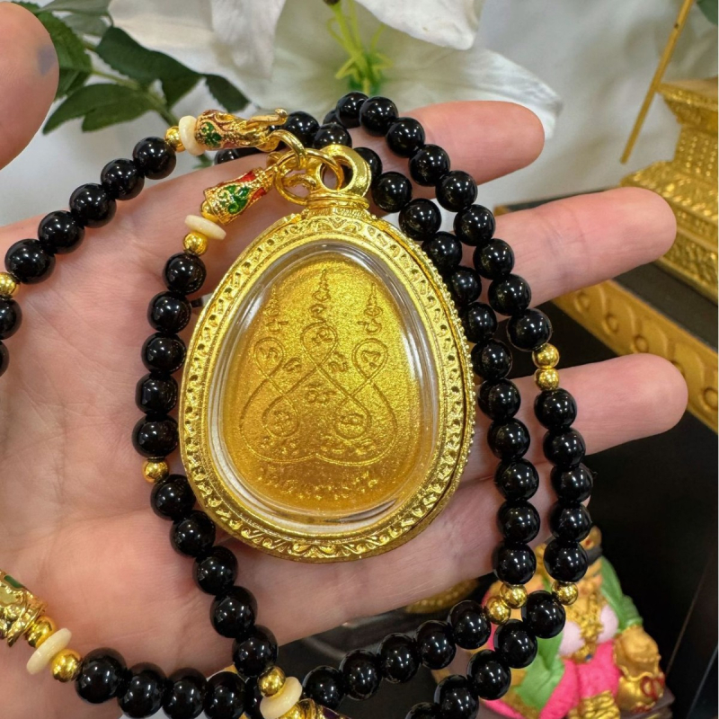 Tajlandski budistički amulet s skrivenim licem