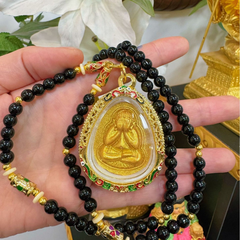 Tajlandski budistički amulet s skrivenim licem