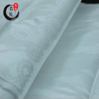 Biela tibetská khata s jacquard vzorom ôsmich požehnaných symbolov pre buddhistické obrady