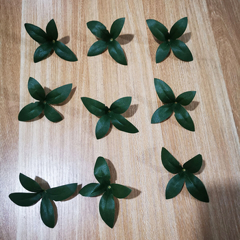 Floare artificială cu frunze de rod și plasă mătase, plantă decorativă pentru ședințe foto
