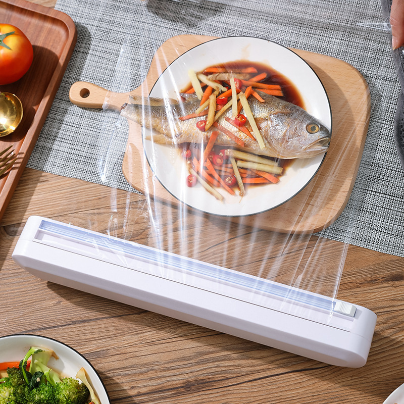 Tăietor pentru folie alimentară cu ventuză și cutie reglabilă de depozitare — instrument creativ de bucătărie