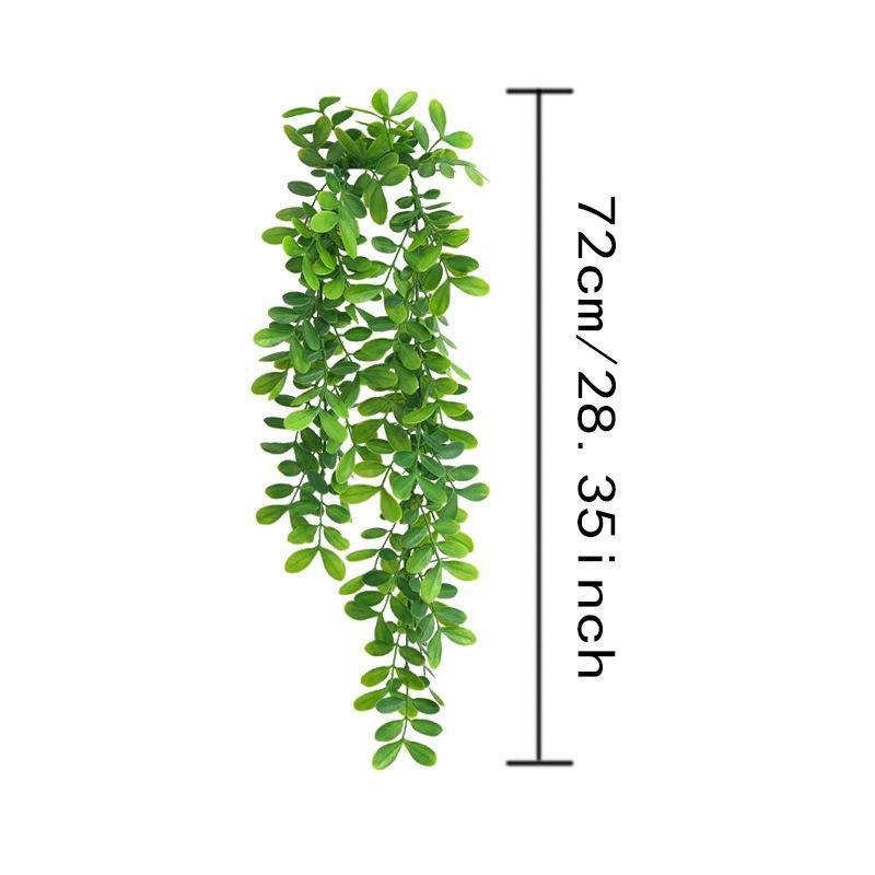 Plantă artificială atârnată, verde, cu frunze decorative — decor de perete