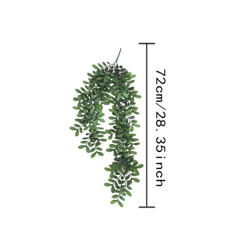 Plantă artificială atârnată, verde, cu frunze decorative — decor de perete