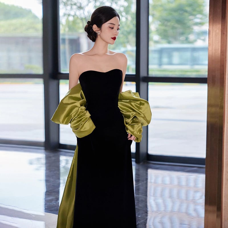 Crna večernja haljina s mašnicom i trakom, francuska elegancija visoke klase, lagani luksuz, butik stil