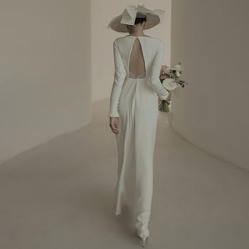 Francuski stil lagana vjenčana haljina, ljeto 2026, minimalistički Hepburn stil, dugi rukavi, bijela saten haljina s otvorenim leđima