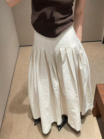 Kremasto-bijela plisirana A-linijska midi suknja za žene, nova jesen, butik stil, visokog struka, vizualno stanjiva silueta, svestrana