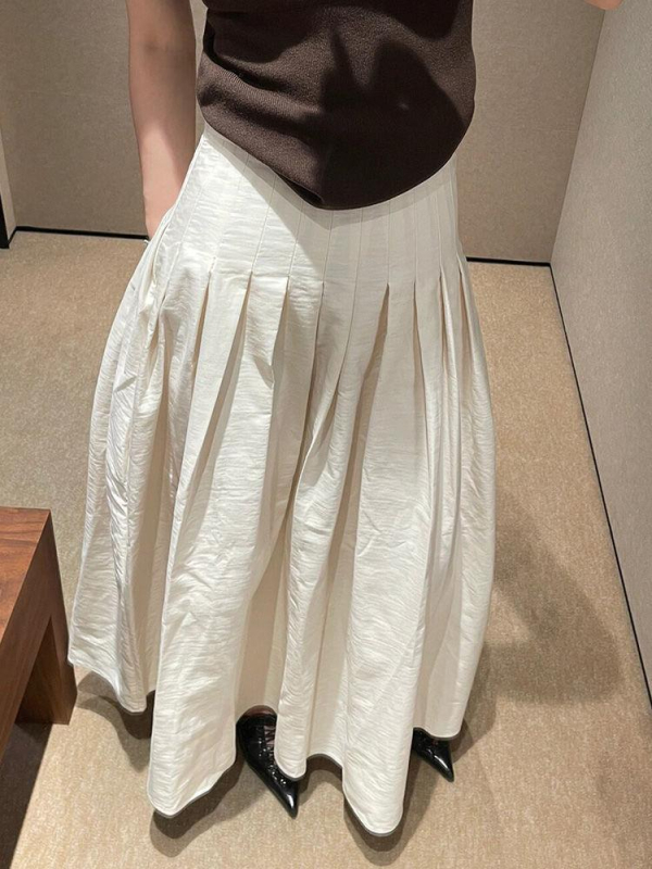 Kremasto-bijela plisirana A-linijska midi suknja za žene, nova jesen, butik stil, visokog struka, vizualno stanjiva silueta, svestrana
