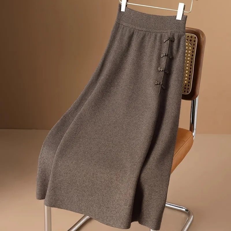 Vunena pletena midi suknja s visokim strukom, jednobojna, elastična, wrap stil, kineski čvorovi na kopčama