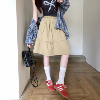 Prava fotografija — udobna svakodnevna suknja s elastičnim strukom, visokim strukom, A-linija midi kroj, puff detalj, za sitne figure.