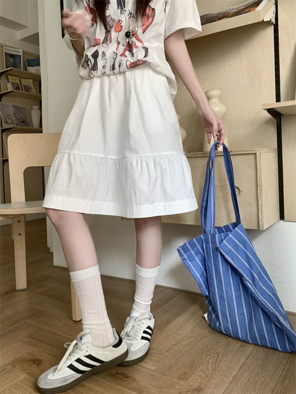 Prava fotografija — udobna svakodnevna suknja s elastičnim strukom, visokim strukom, A-linija midi kroj, puff detalj, za sitne figure.