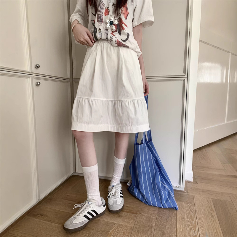 Prava fotografija — udobna svakodnevna suknja s elastičnim strukom, visokim strukom, A-linija midi kroj, puff detalj, za sitne figure.