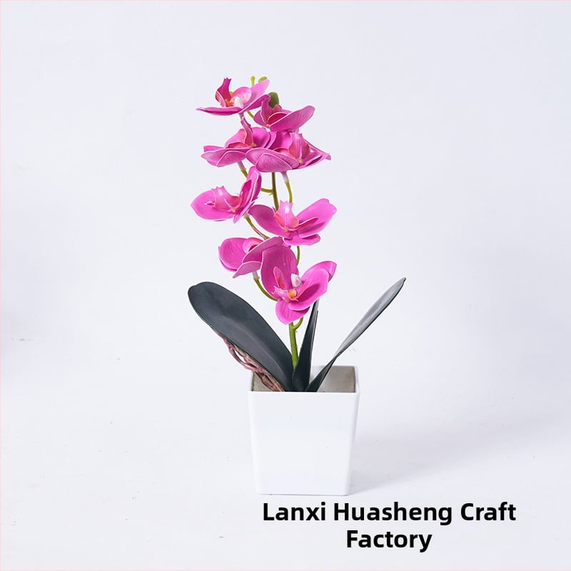 Umelá orchidea Phalaenopsis v kvetináči pre domáce a kancelárske dekorácie