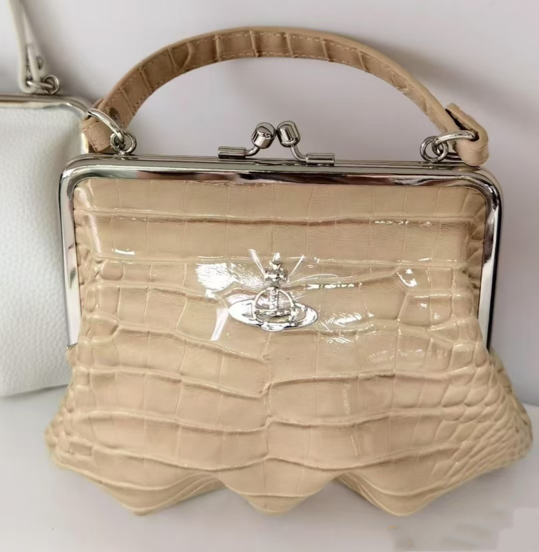 Torba Dumpling Empress Dowager Saturn, proljeće-ljeto 2026, moderna visoko-kvalitetna retro torba s kopčom i lancem, mala crossbody