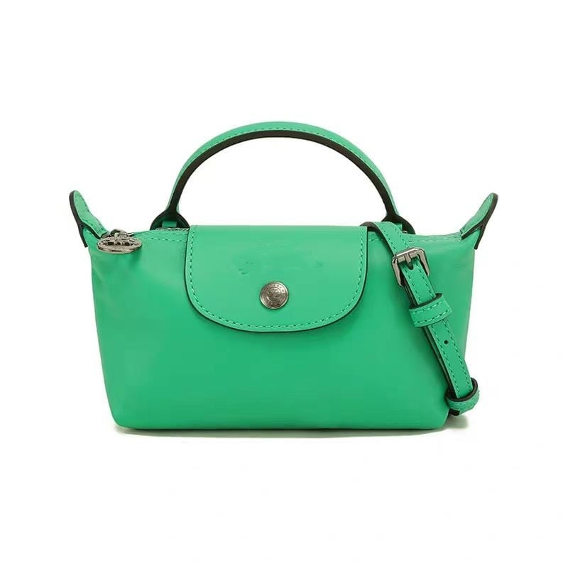 Bőr mini dumpling táska kapcsos fedéllel, belső cipzáros zsebbel, váll- és crossbody pánttal, telefon- és sminktáska, női táska