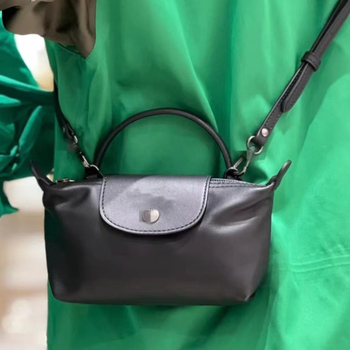 Mini PU dumpling torbica s jednom ručkom; može se nositi preko ramena ili kao crossbody; kompaktna ženska torbica za telefon i kozmetiku.
