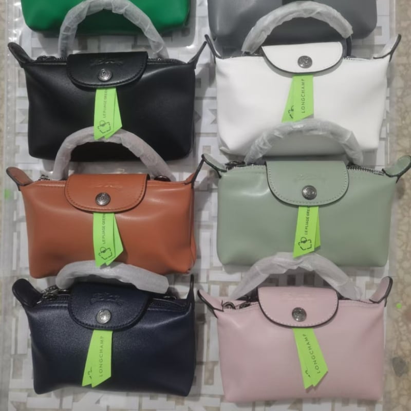Mini PU dumpling torbica s jednom ručkom; može se nositi preko ramena ili kao crossbody; kompaktna ženska torbica za telefon i kozmetiku.