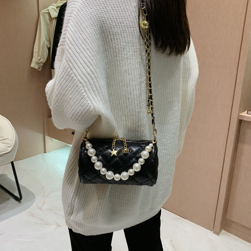Ženska mini crossbody torbica s bisernim lancem, ljeto, cilindrični oblik, luksuzan izgled