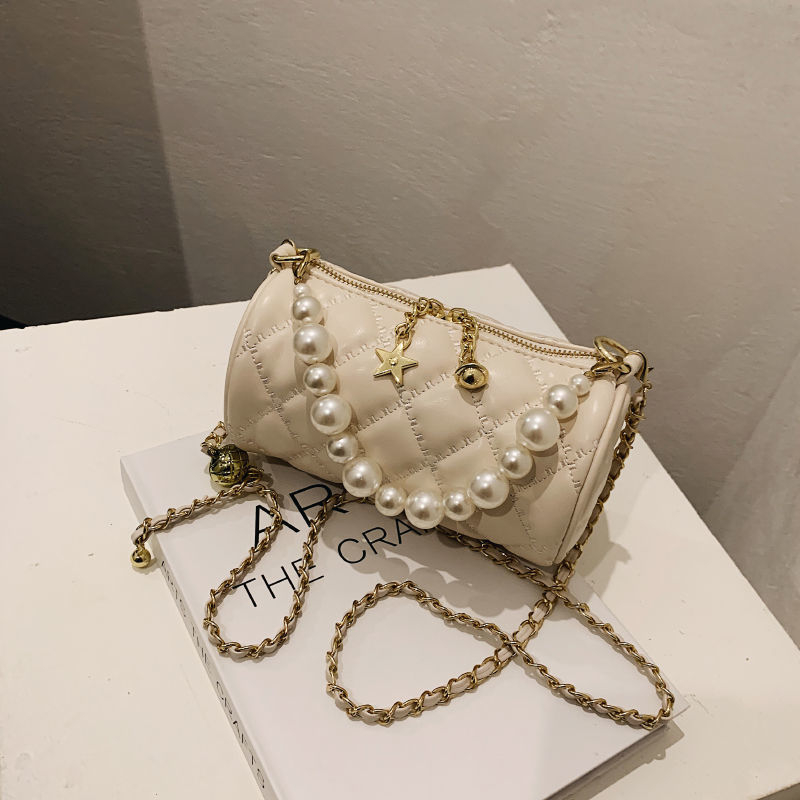 Ženska mini crossbody torbica s bisernim lancem, ljeto, cilindrični oblik, luksuzan izgled