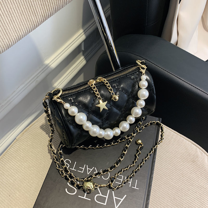 Ženska mini crossbody torbica s bisernim lancem, ljeto, cilindrični oblik, luksuzan izgled