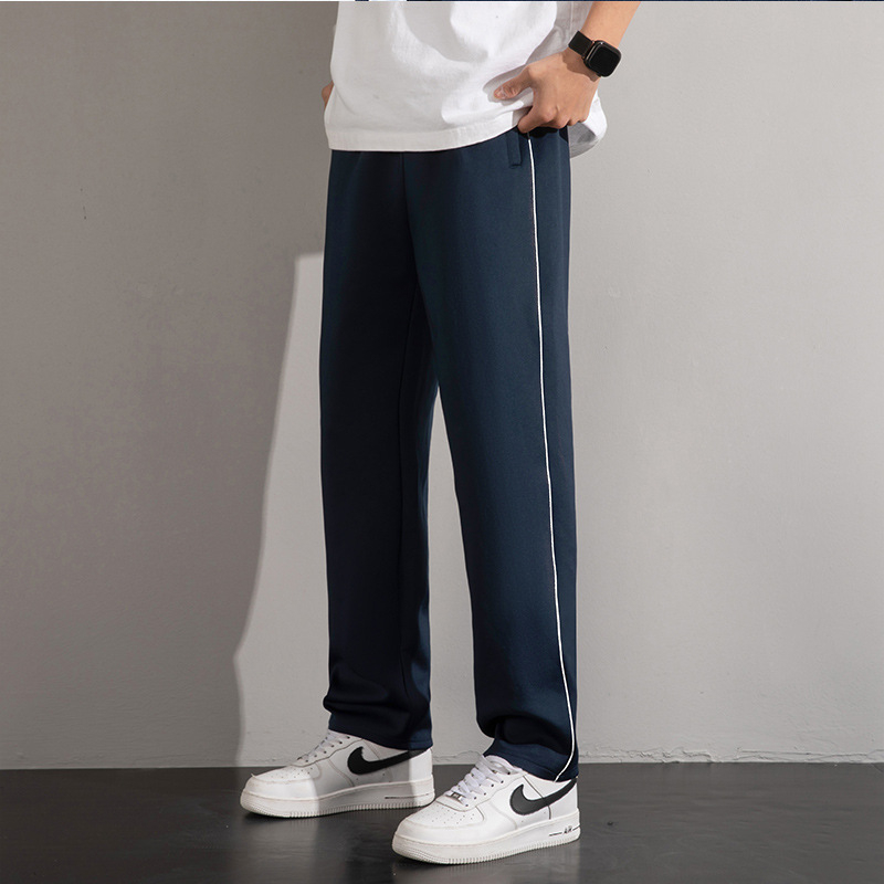 Školske hlače s flis podstavom, tmavomodre, s jednom trakom, unisex, opuštenog ravnog kroja, za učenike od osnovne do srednje škole