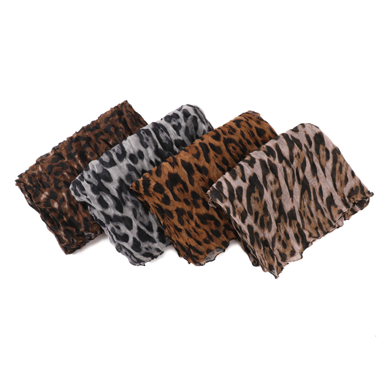 Légáteresztő Bali szálból készült hosszú sál, leopard mintával, ráncolt textúrával
