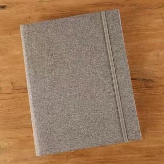 Fotoalbum s textilným obalom a gumičkou, 200 strán, 6-palcový vodorovný formát, čierny obal