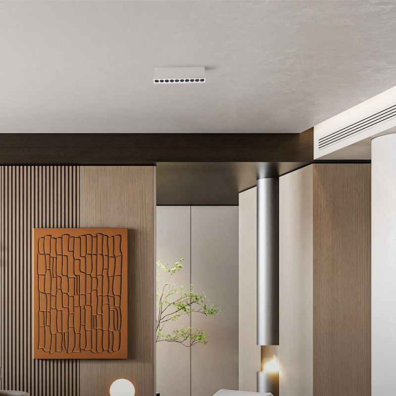 LED reflektor s povrchovou montážou – lineárne osvetlenie steny do obývačky
