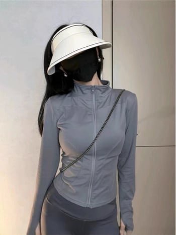 Fekete Ice Silk női jóga felső, karcsú szabásvonal, álló gallér, UV-védelem, nyár