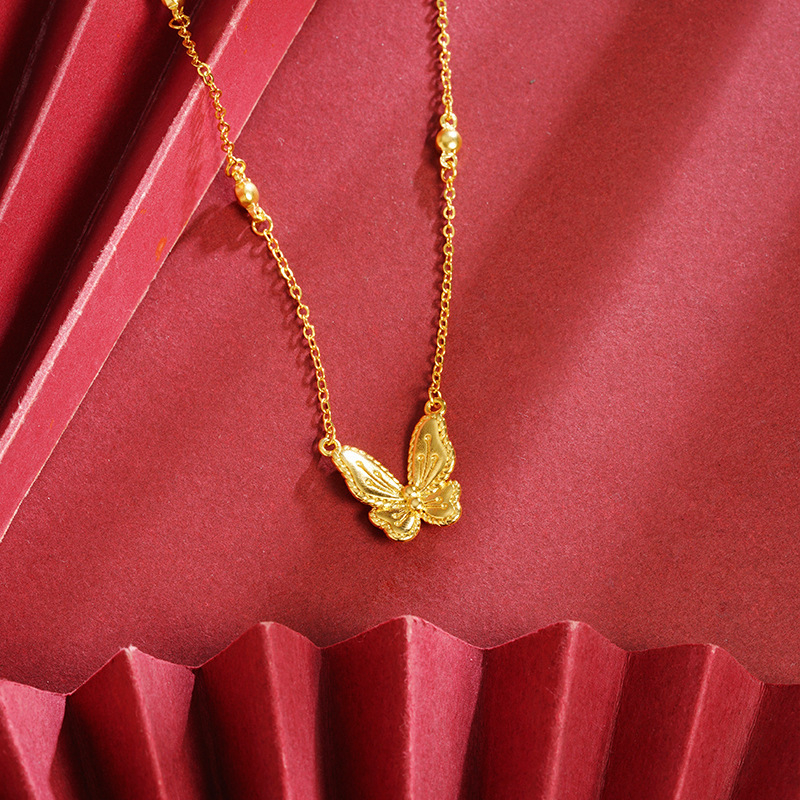 Zlatni set nakita s leptirovim motivom, ogrlica i privjesak, elegantan stil