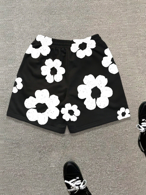 Muške ljetne šorceve s crno-bijelim cvjetnim uzorkom, opušteni sportski stil za proljeće i ljeto.