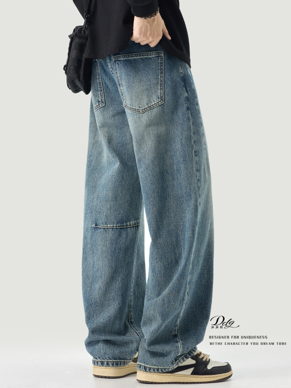 Férfi pamut denim nadrág, nehéz anyagú, ősz 2025, zsinóros derék és elasztikus derék, laza szabás, egyenes szár, mosott hatás, ívelt szegély.
