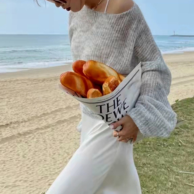 Ženski tanki pleteni top s izrezom i okruglim izrezom, off-shoulder detalj, slobodan kroj, proljetni stil
