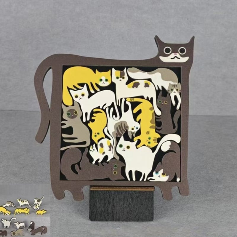 Drevené puzzle v tvare mačky s rôznymi tvarmi mačiatok.