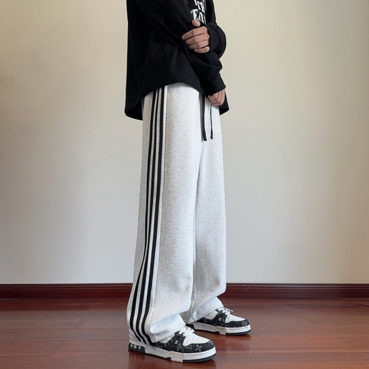 Férfi sportos szabadidőnadrág, széles szabás, három csíkos minta, egyenes, laza, őszre